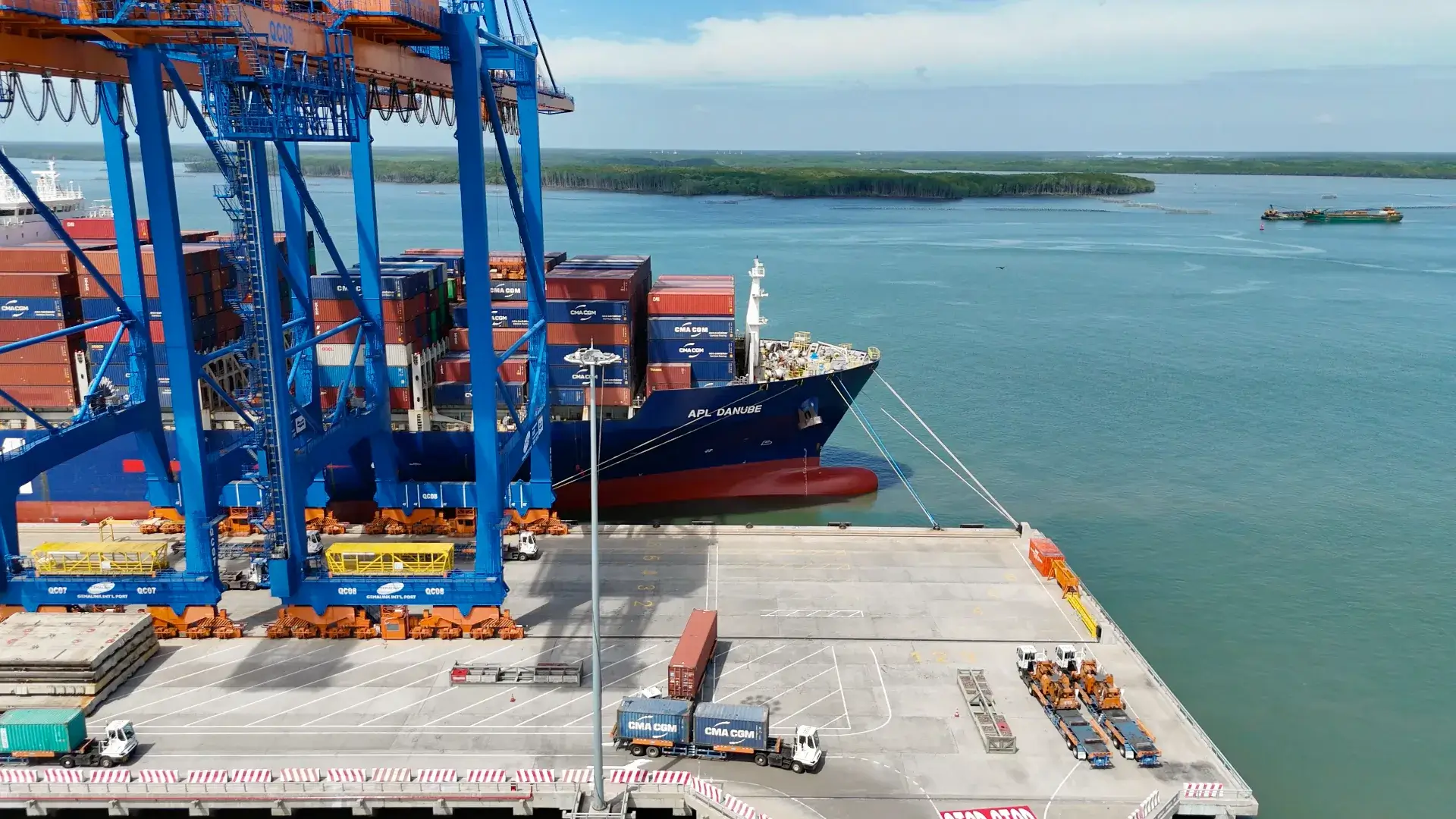 Fully loaded cargo ship at port terminal for international container shipping and global logistics